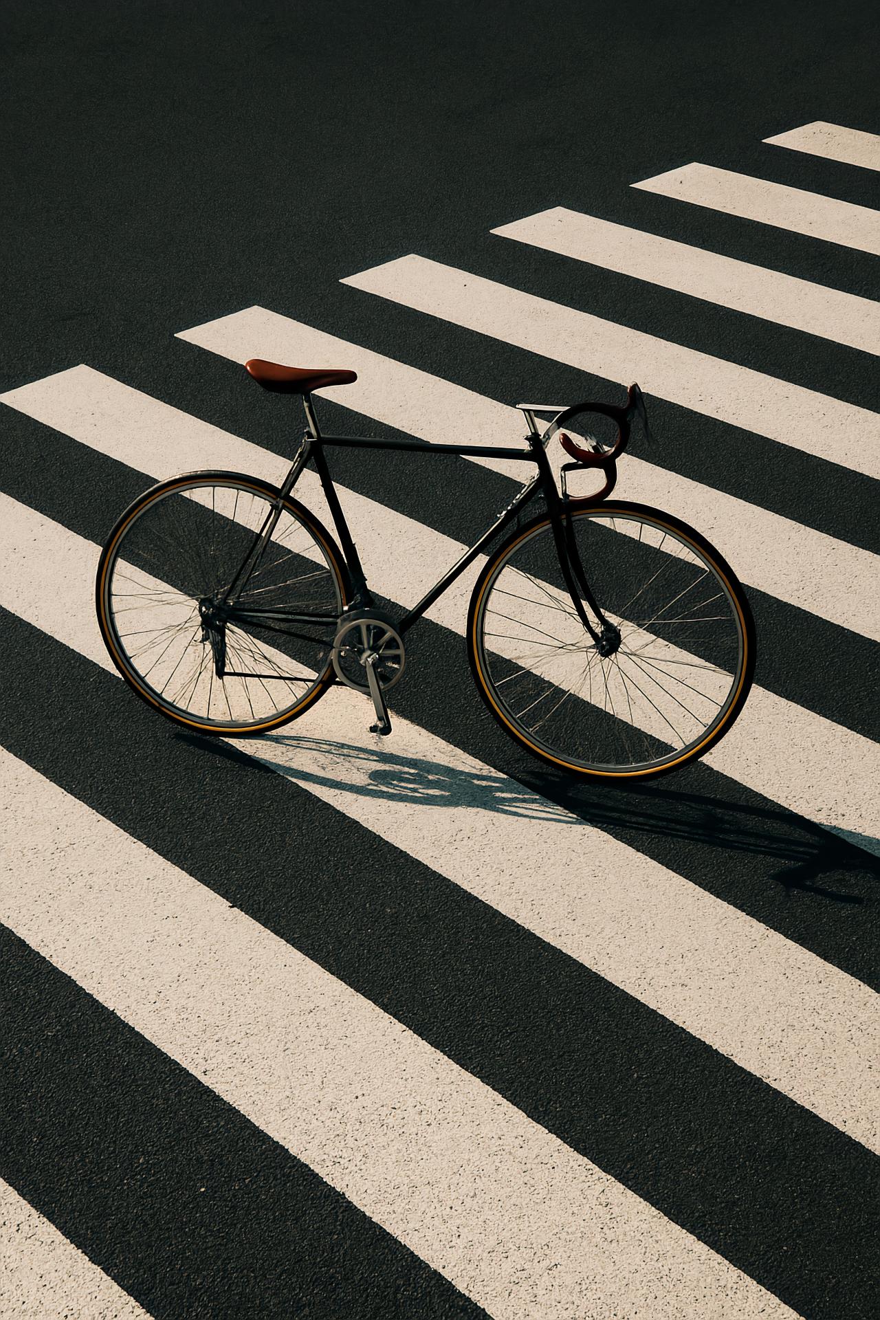 Close-up of carbon fiber hybrid bicycle wheel with spokes and tire