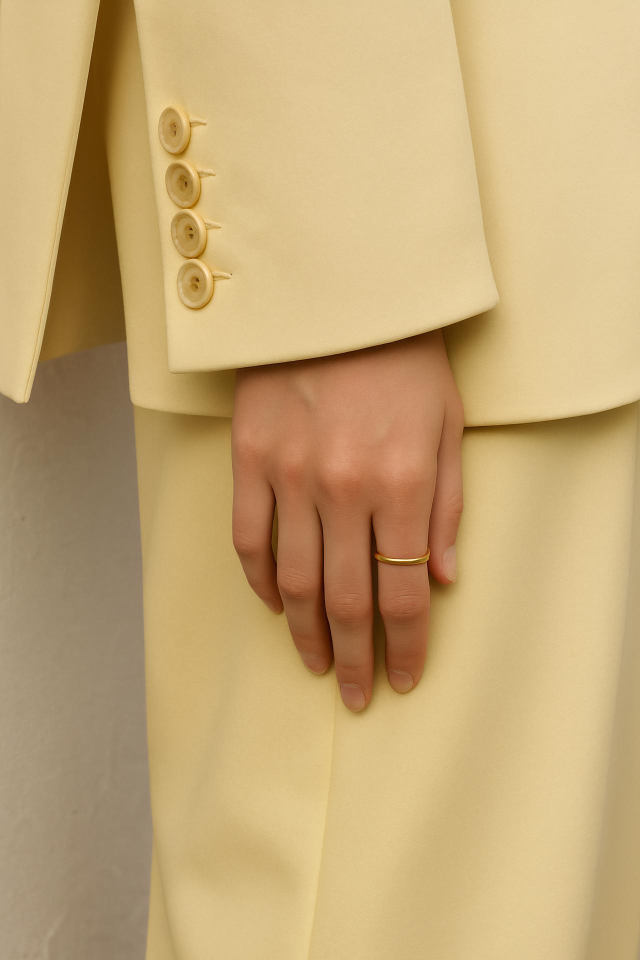 Gold wedding, engagement, and pre-engagement rings made from natural materials