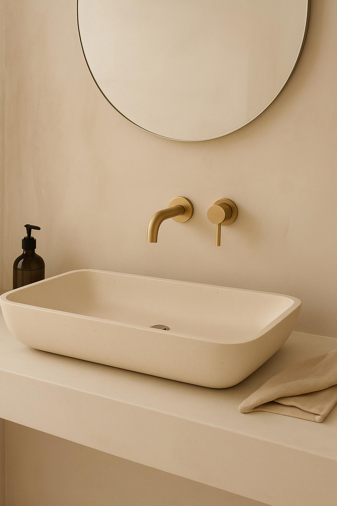 Modern bathroom with brown ceramic fixtures, sink, tap, bathtub, mirror, and houseplant