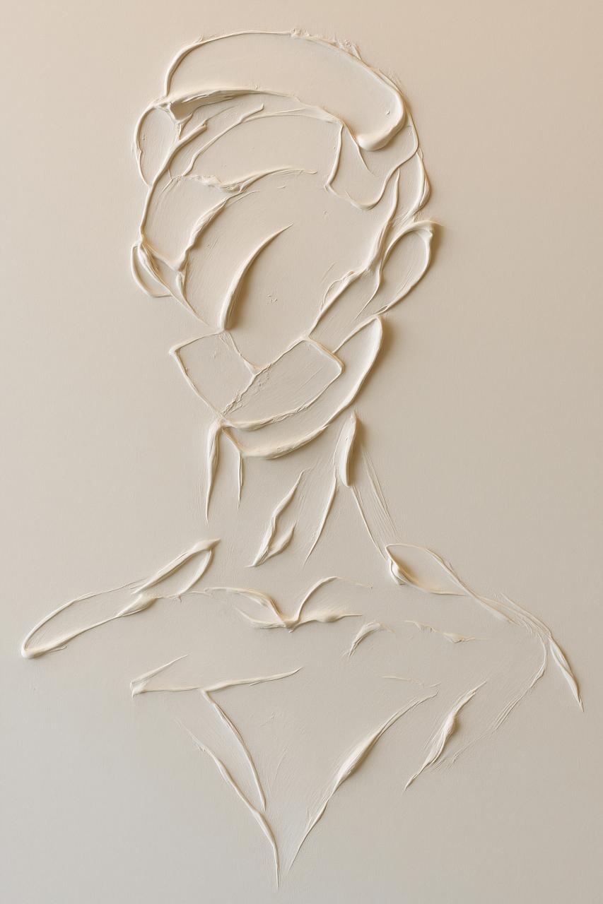 Intricate paper carving art with shadow effects