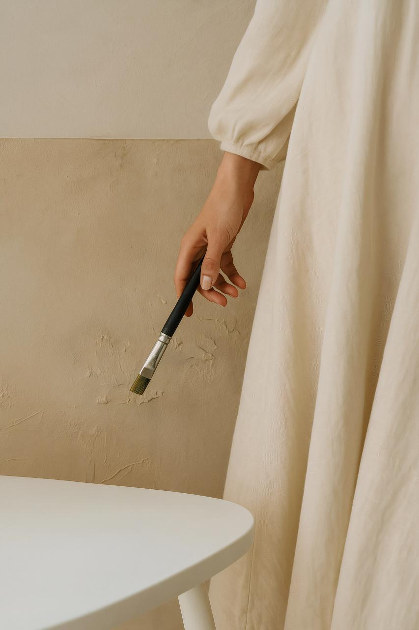 Bathtub with linens on wood flooring