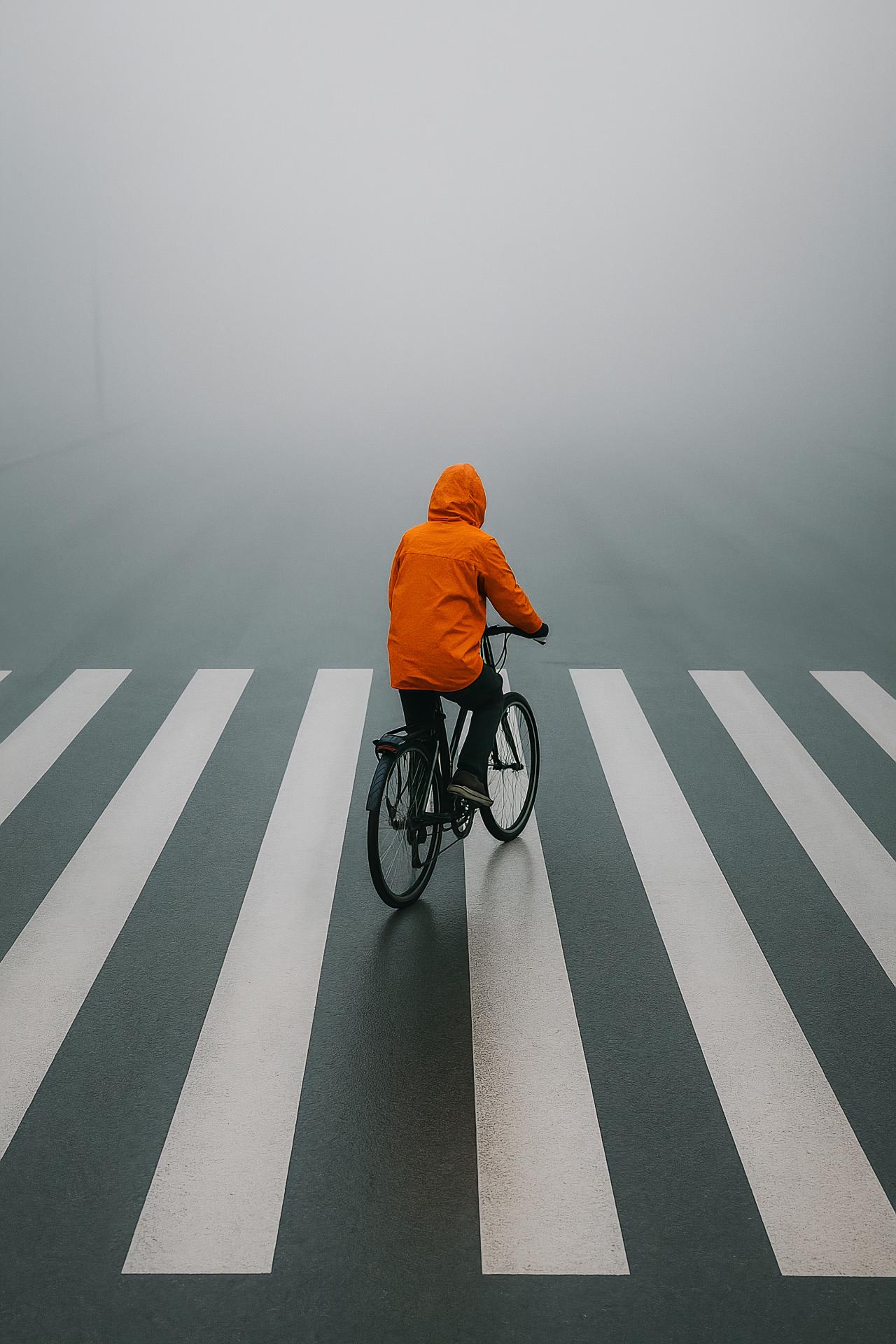 Bicycle crossing zebra lines on city road