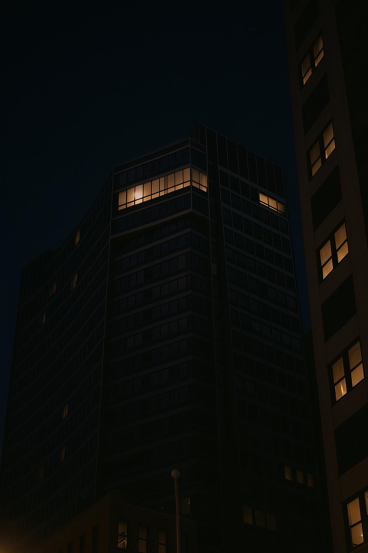 Cityscape with skyscrapers and commercial towers at night