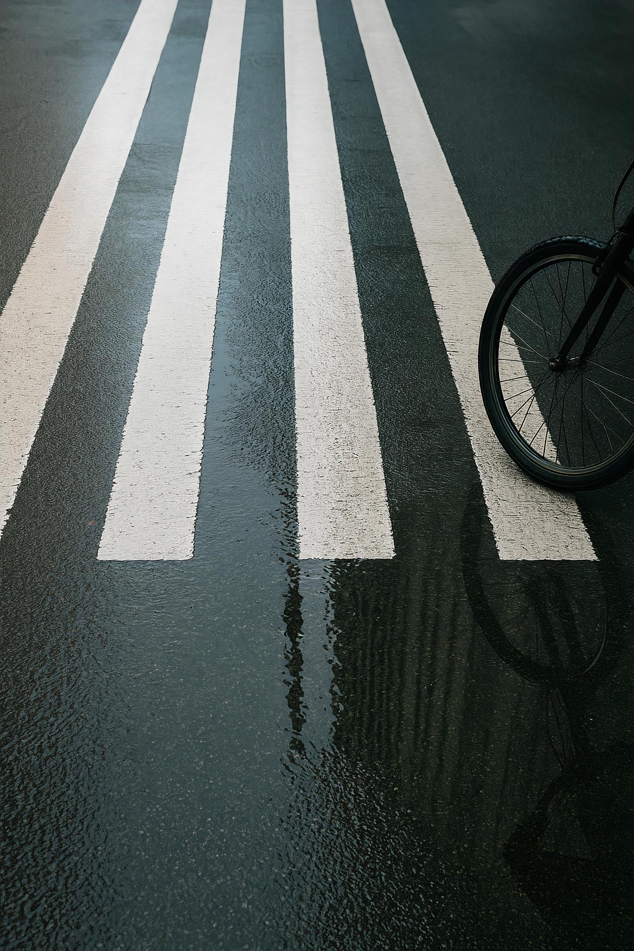 Zebra crossing, pedestrians, bicycles, asphalt road, sidewalk, black and white, carbon fibers