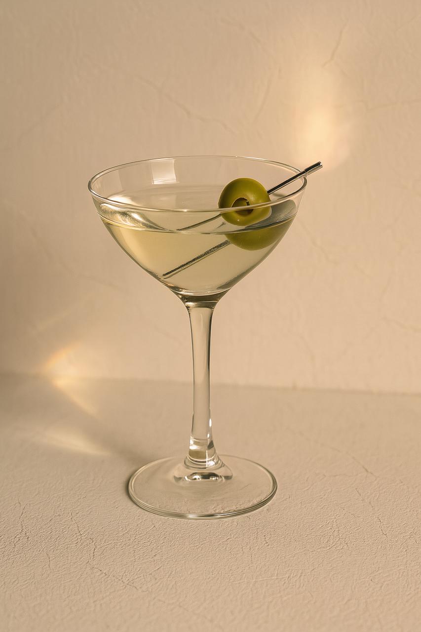 Assortment of elegant stemware including martini and champagne glasses