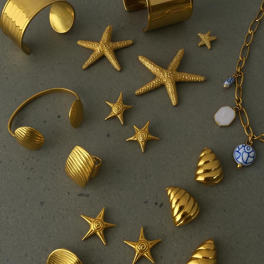 Golden starfish earrings, bracelets, and rings on display