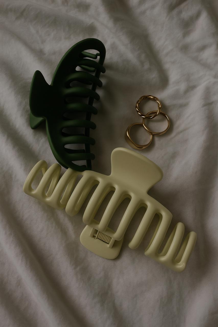 Modern jewellery piece with plastic moustache, symbolizing creativity and style