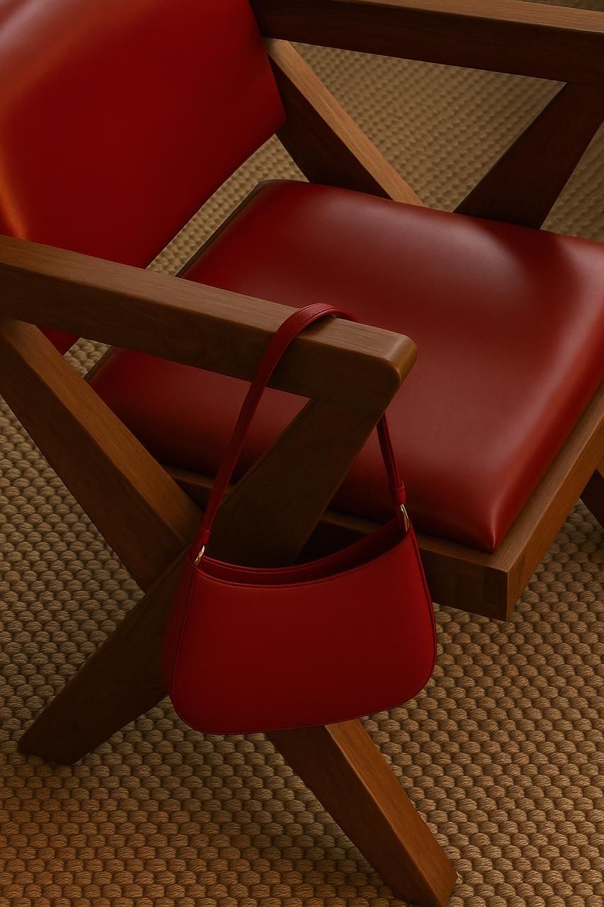 Orange hardwood plywood folding chair with armrests