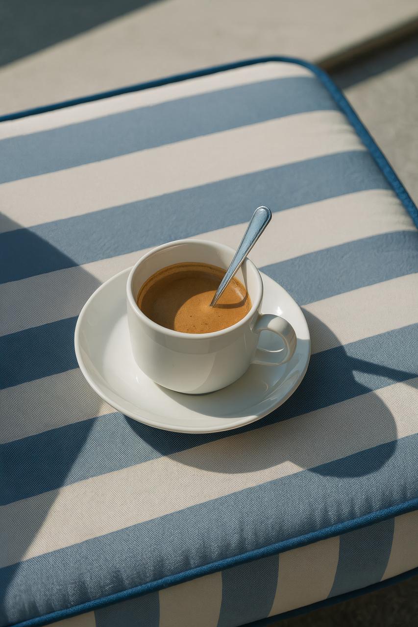 Outdoor espresso table setting with modern furniture and cuban espresso serveware