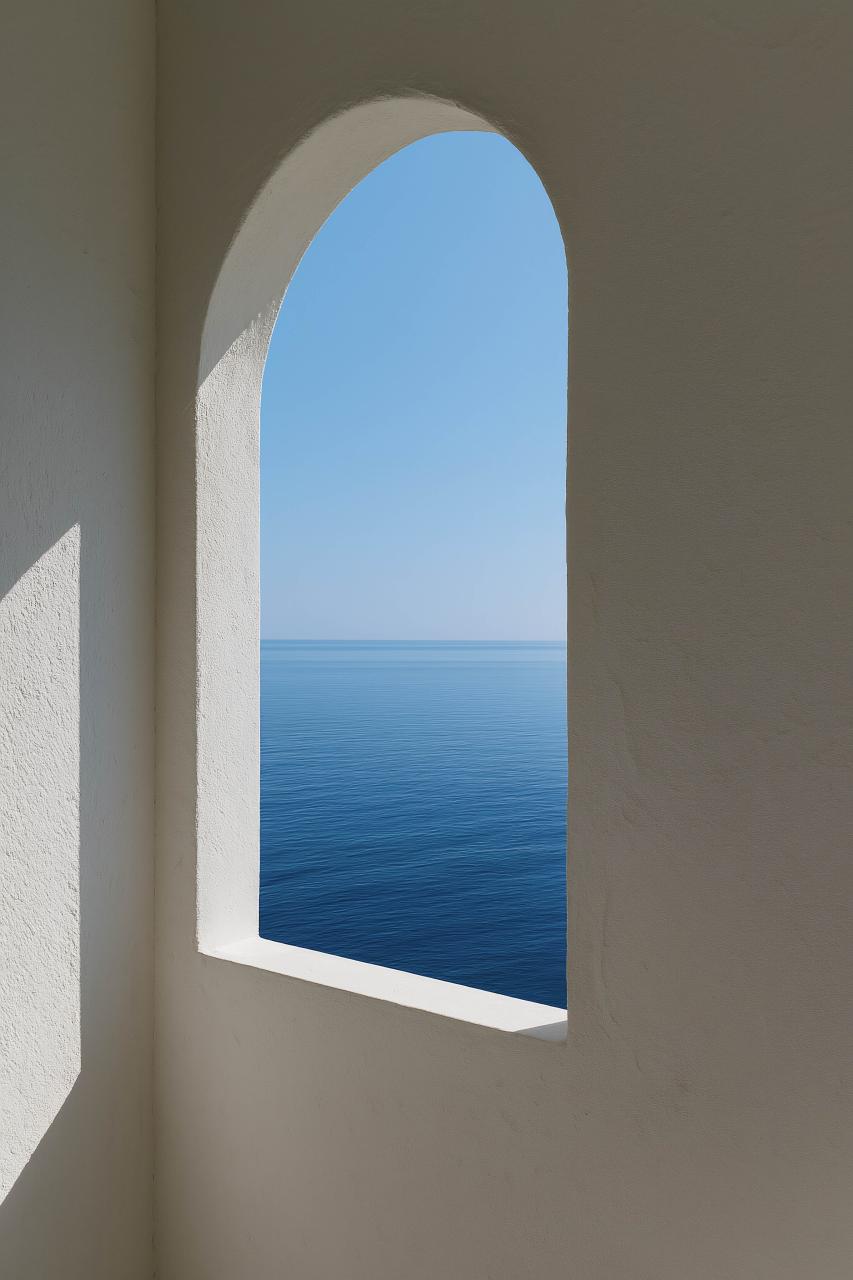 Ocean archway in daylight with shadow over sea