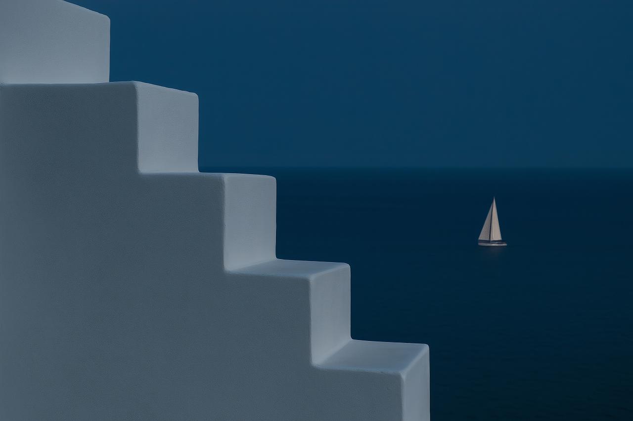 Sailboat on blue ocean with shadow