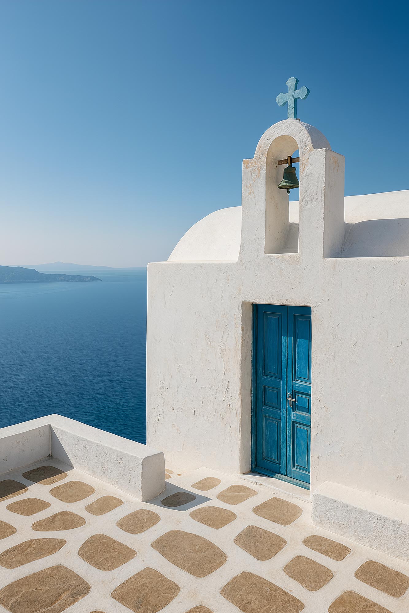 Blue ocean coastline with dome and finial