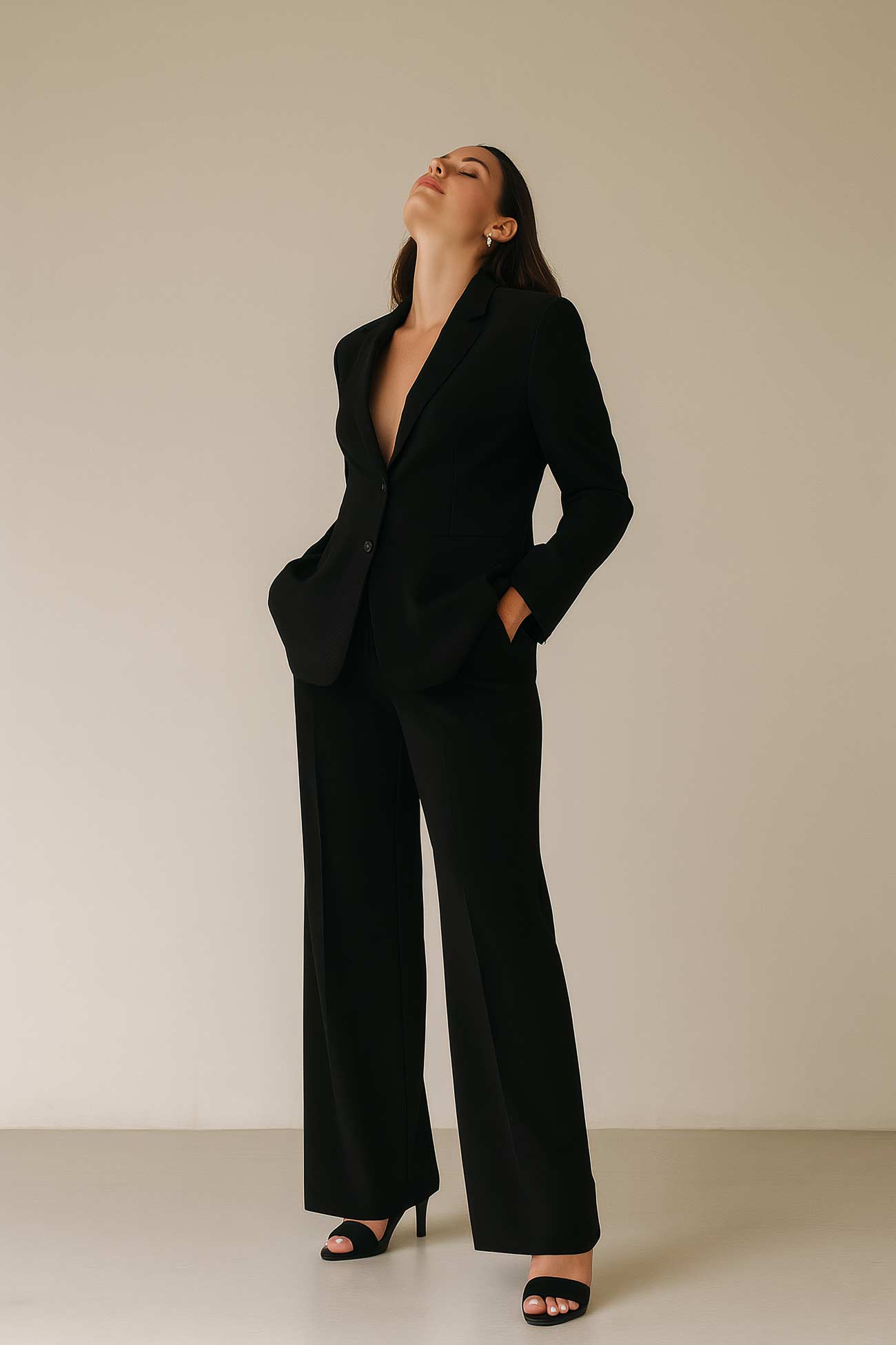Fashion model in formal blazer and trousers
