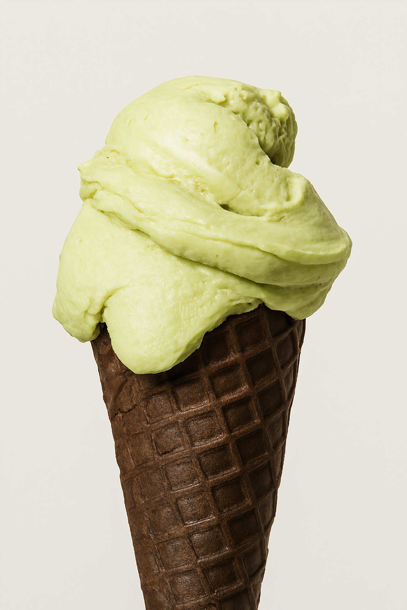 Colorful ice cream cone assortment on a white background