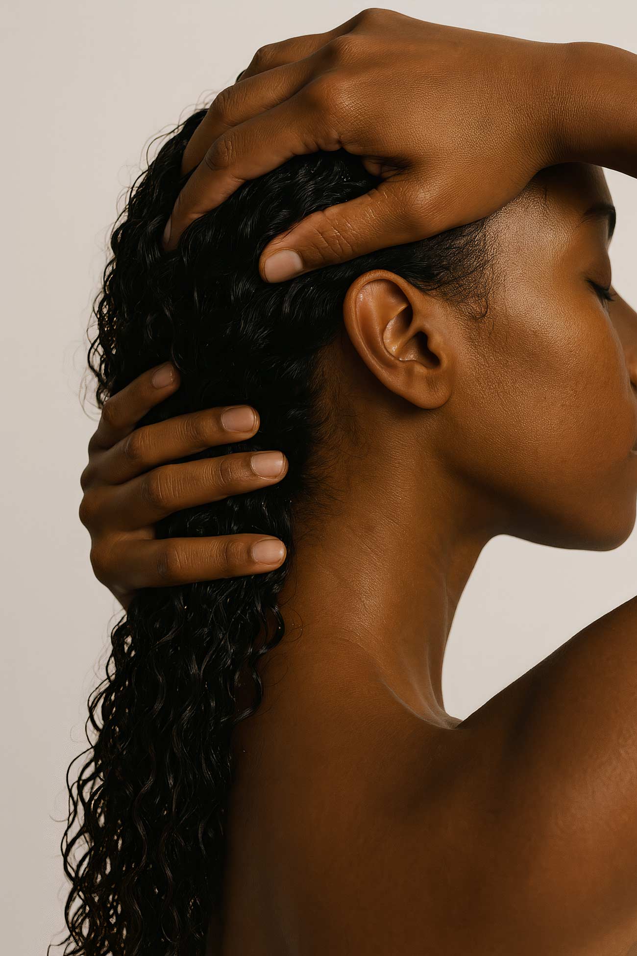 Model with black hair in ringlets, afro, dreadlocks, braids, ponytail