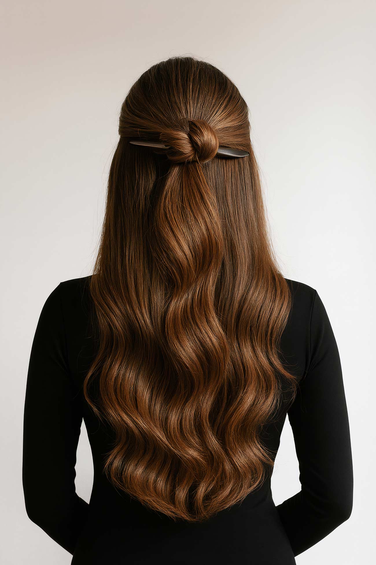 Long layered brown and blond hair with lace, knots, and braids