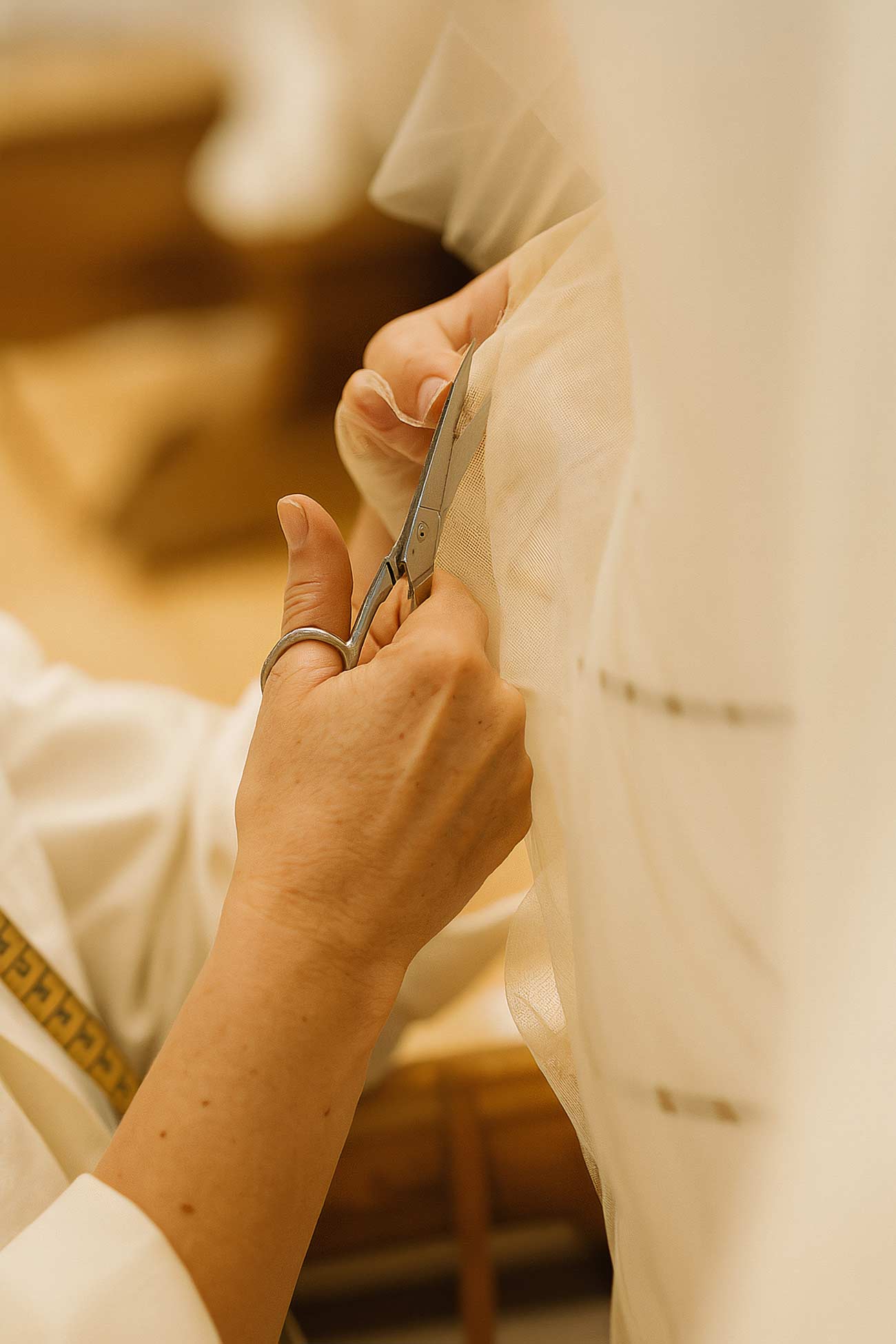 Exchange of vows with focus on intertwined fingers and nail art