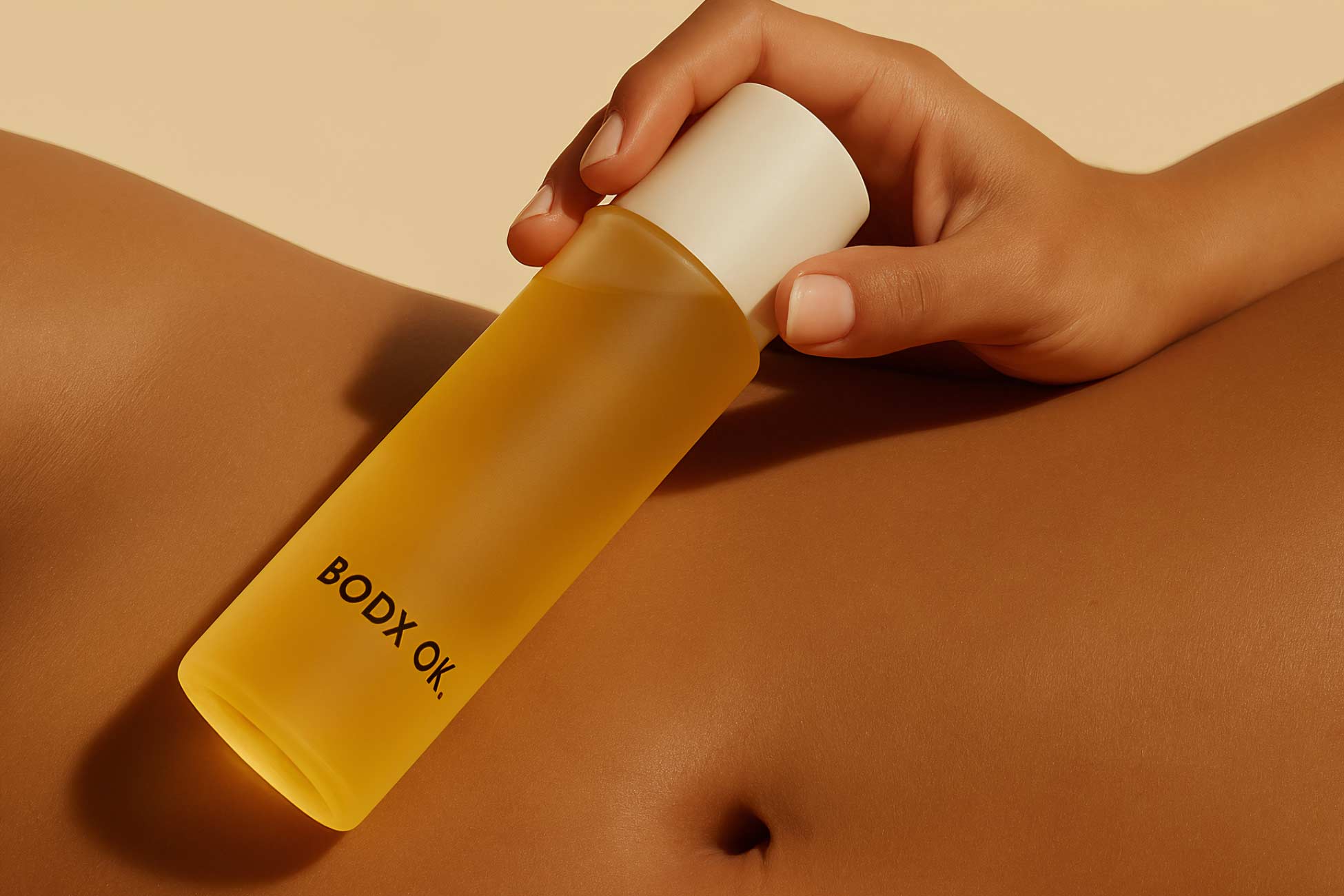Girl holding skin care plastic bottle