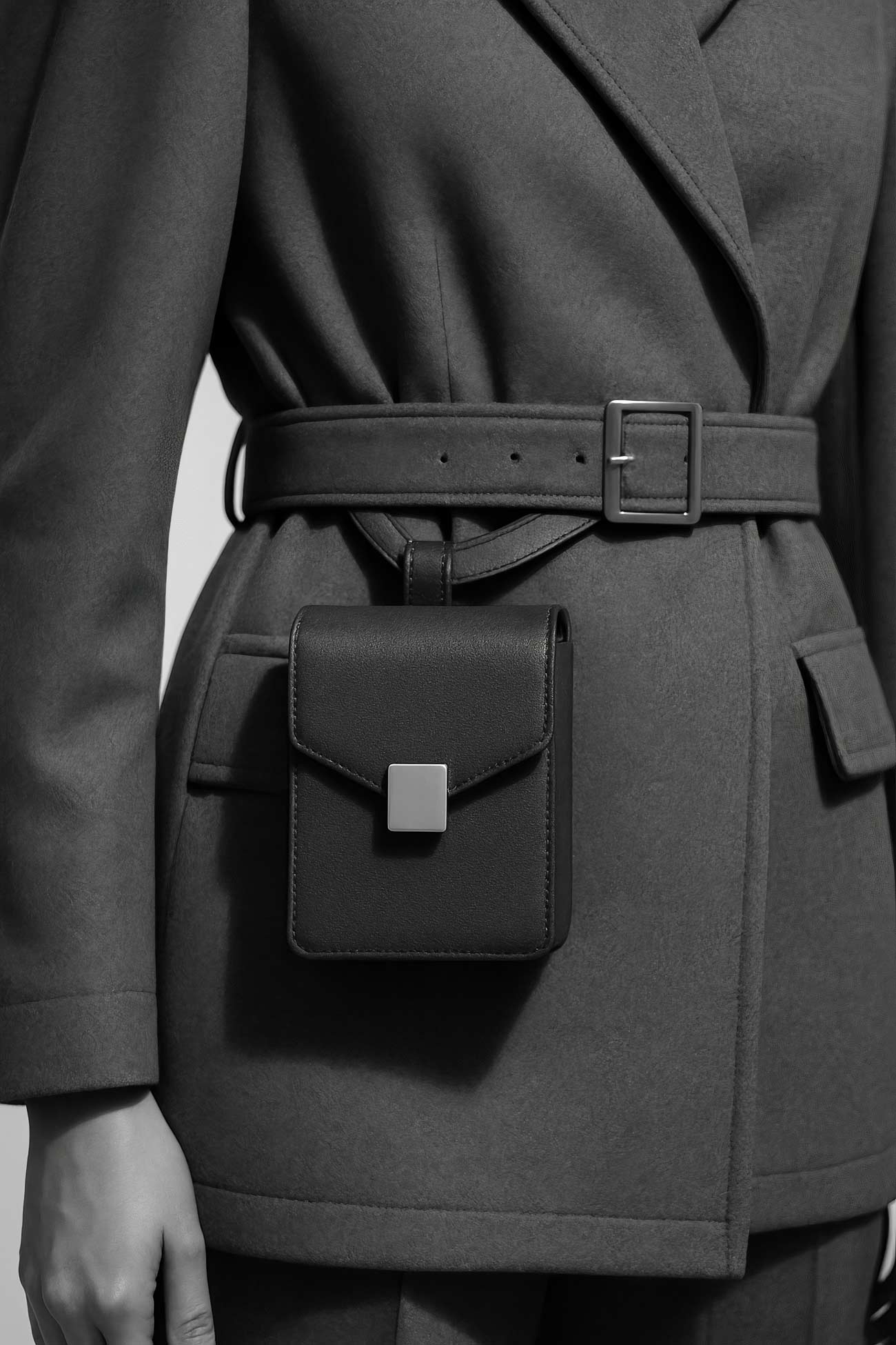 Silver leather satchel bag with trench coat, wallet, and mail bag