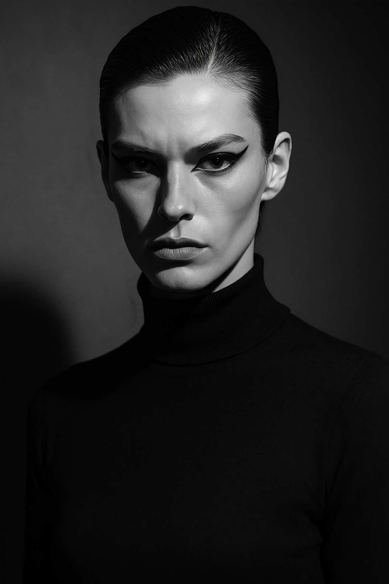 Black and white portrait of a stylish gentleman with striking features