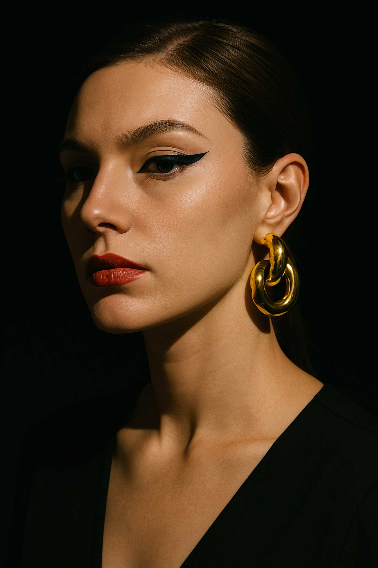 Fashion model with bold lips and elegant jewellery