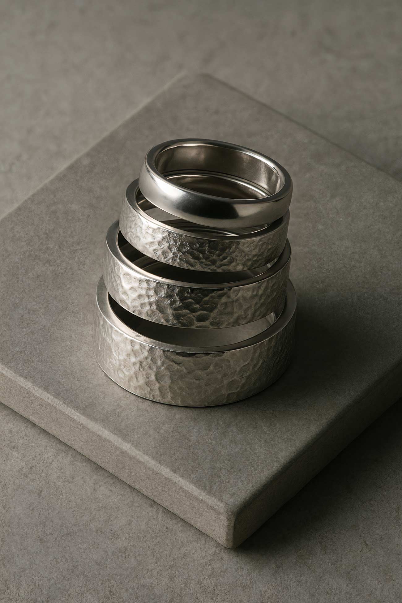 Silver titanium wedding ring on display