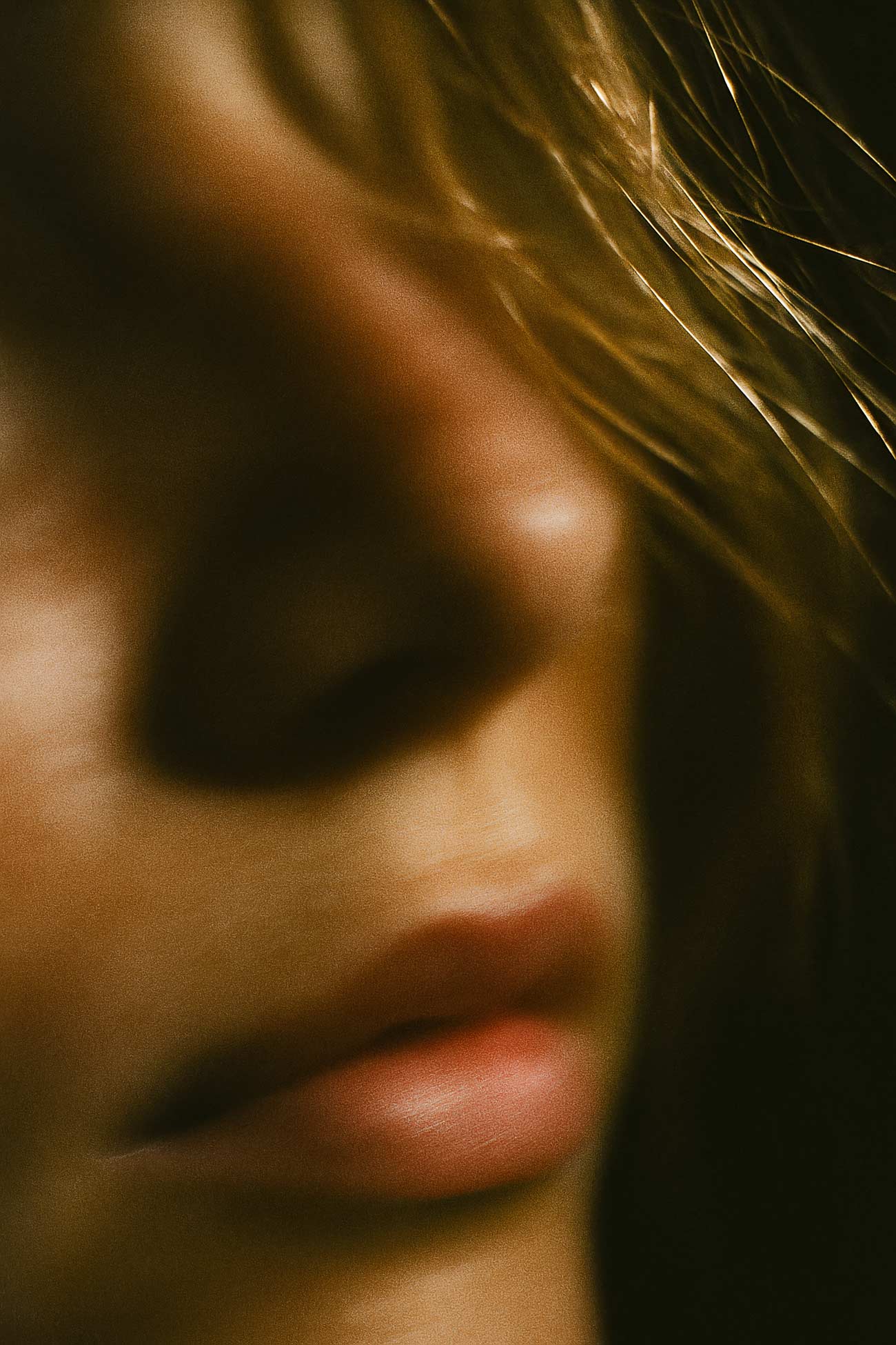 Close-up beauty portrait with eyebrow, lips, and layered hair
