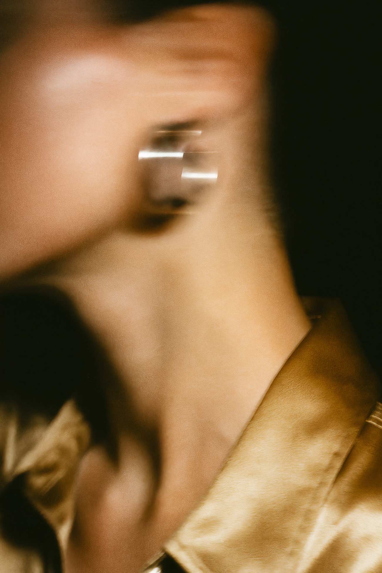 Fashionable girl with body piercings and earrings