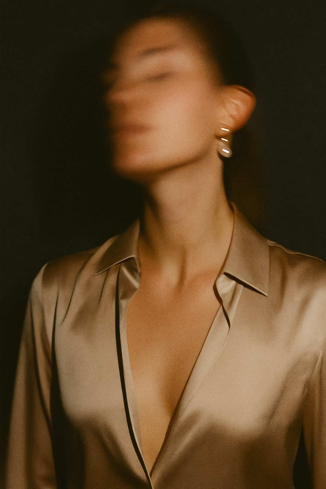 Fashion model in silk and satin outfit during a photo shoot
