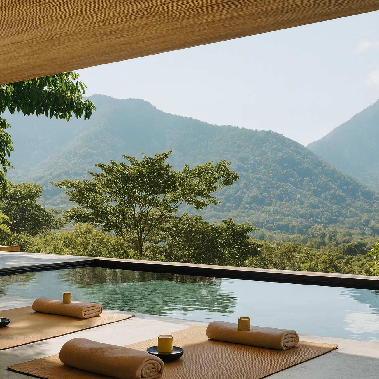 Mountain resort eco hotel with swimming pool in lush jungle setting