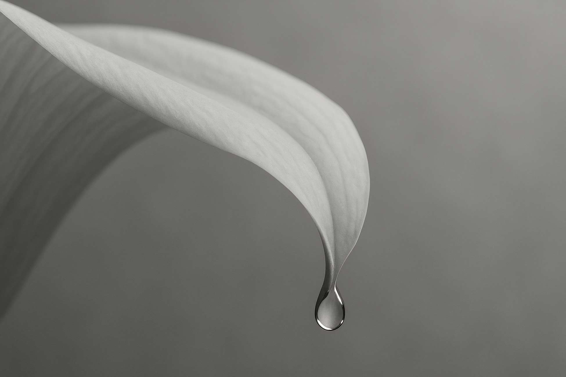 Silver liquid drops close-up macro photography